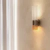 Applique doppia Sbàrlusc in vetro rosso e ottone champagne di Isacco Brioschi