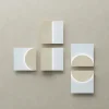 Applique Modulare X in ferro con finitura bianca e pietra beige