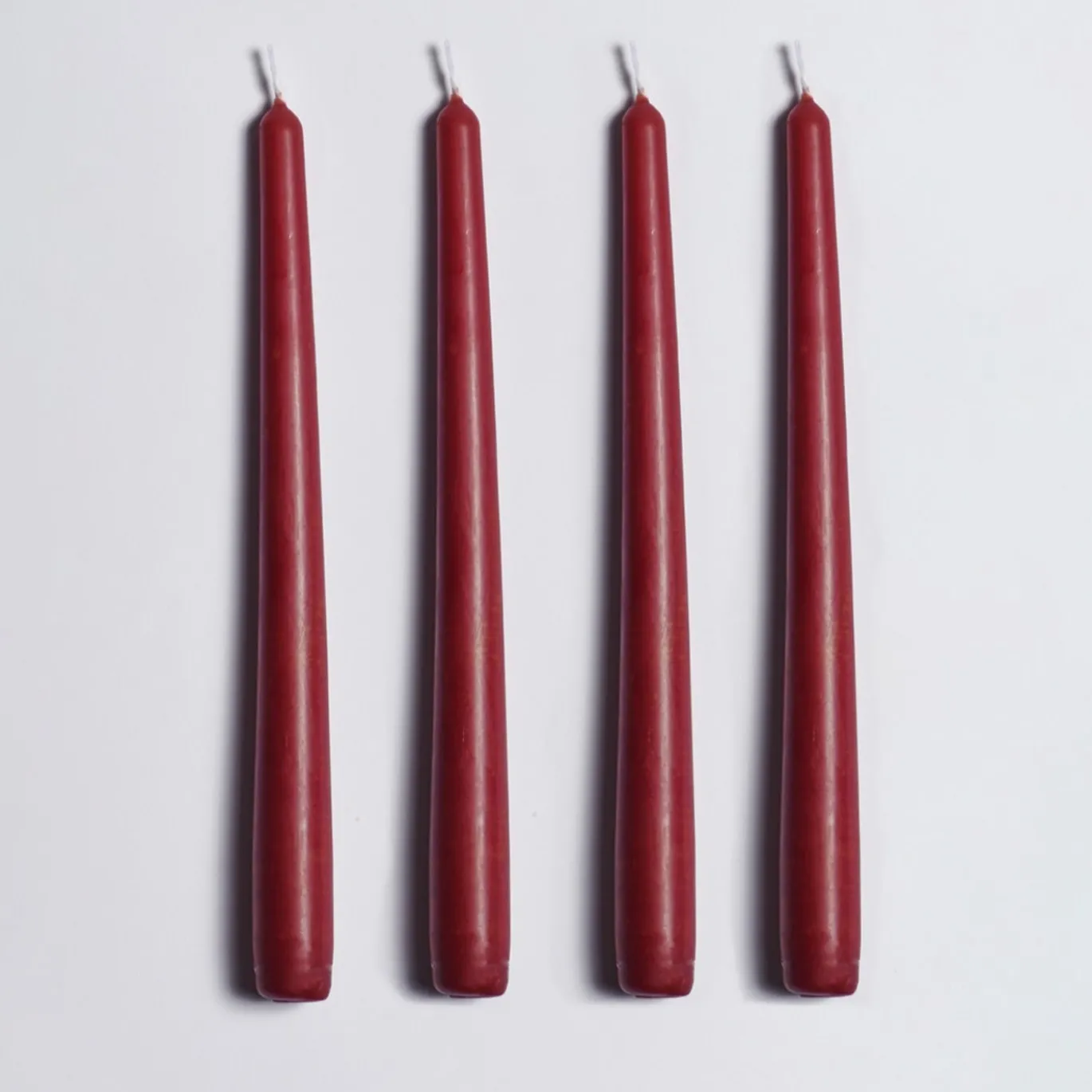 Candeliere in ceramica fucsia con 4 candele profumate
