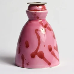 Candeliere in ceramica fucsia con 4 candele profumate