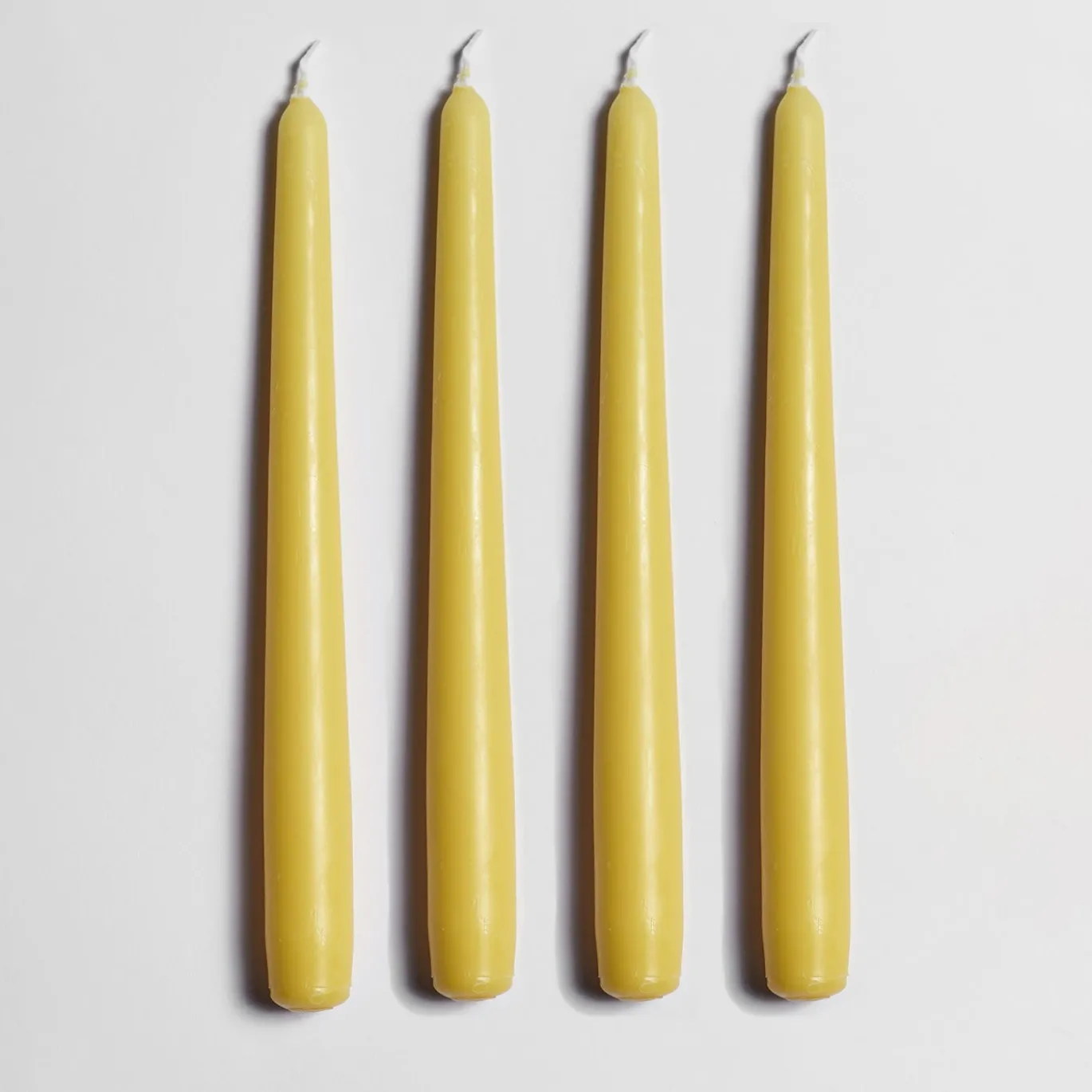 Candeliere in ceramica gialla con 4 candele profumate