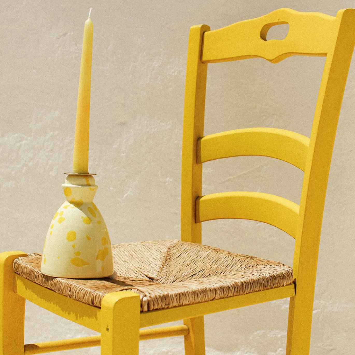 Candeliere in ceramica gialla con 4 candele profumate
