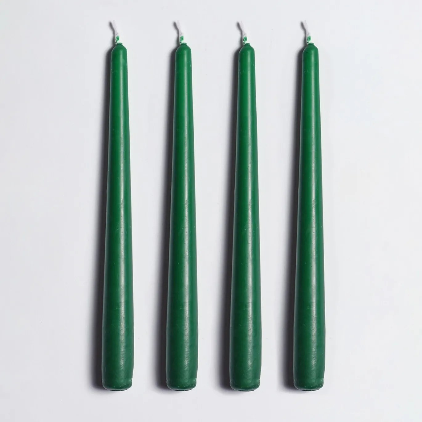 Candeliere in ceramica verde con 4 candele profumate