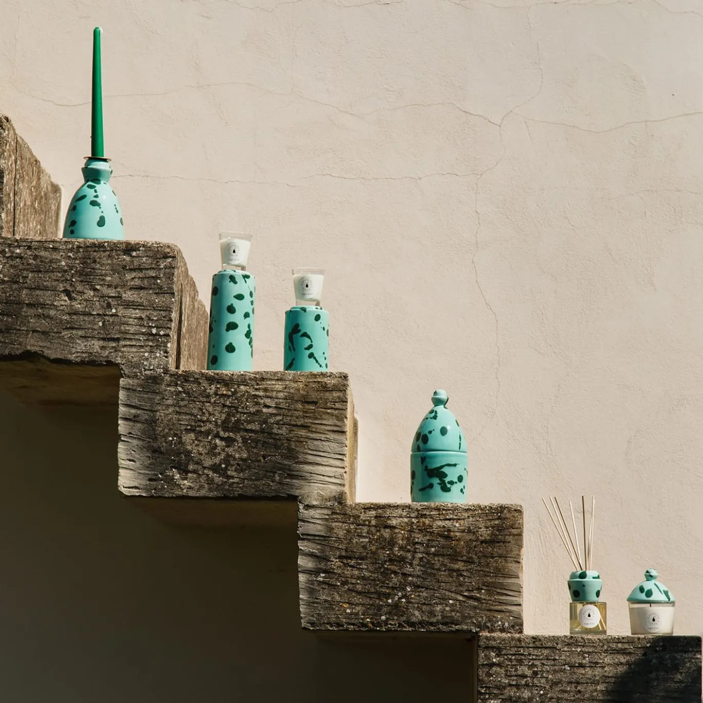 Candeliere in ceramica verde con 4 candele profumate