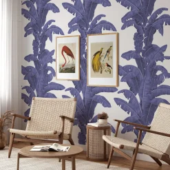 Carta da parati blu con foglie tropicali