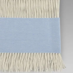 Coperta piccola azzurra con frange Defilé