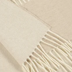 Coperta piccola beige con frange Defilé