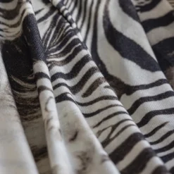 Coperta piccola con motivo a orlo scamosciato Zebra