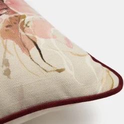 Cuscino dipinto a mano con motivo floreale e bordo rosso