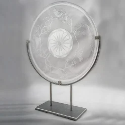 Disco/scultura di uccelli