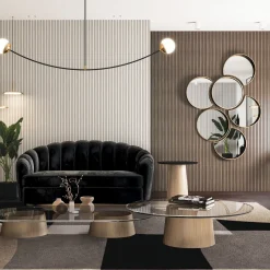 Divano in velluto grigio Nest con base in bronzo