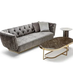 Divano Ivonne in velluto grigio con base in bronzo