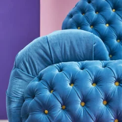 Divano Misstake in tessuto blu con bottoni di Giuseppe Dicecca