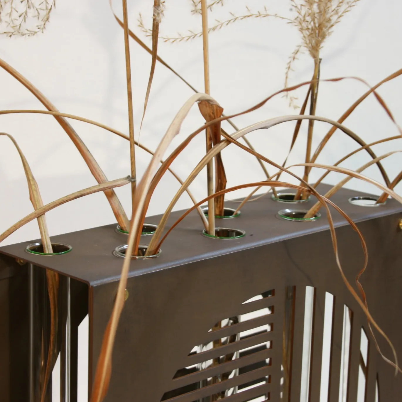 Grafica - Vaso in acciaio corten