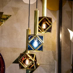 Lampada a sospensione con occhiali colorati