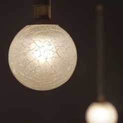 Lampada a sospensione Crystal Ball in metallo finitura Champagne