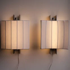 Lampada da parete media Capanni C in lino bianco e acciaio