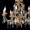 Lampadario a 8 luci in metallo con foglia d'oro anticata e cristallo