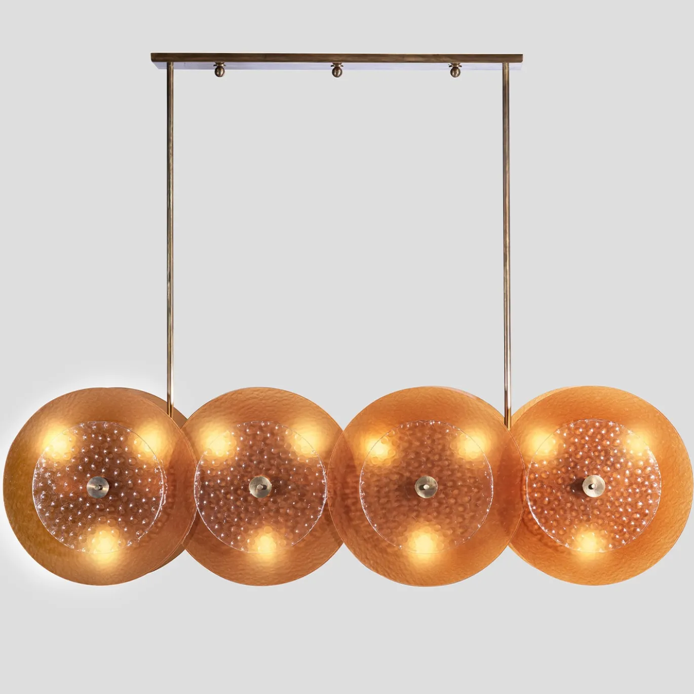 Lampadario in vetro ambra e ottone con quattro dischi