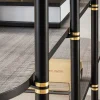 Libreria Boomerang in metallo nero e ottone con 6 ripiani di Pietro Russo Design