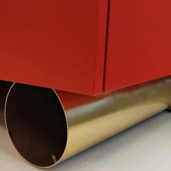 Madia asimmetrica M19 in legno laccato rosso