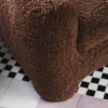Poltrona curva marrone Huit Huit