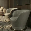 Poltrona girevole Aura in pelle e tessuto grigio