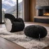Poltrona girevole Egg Lush in pelliccia nera e argento
