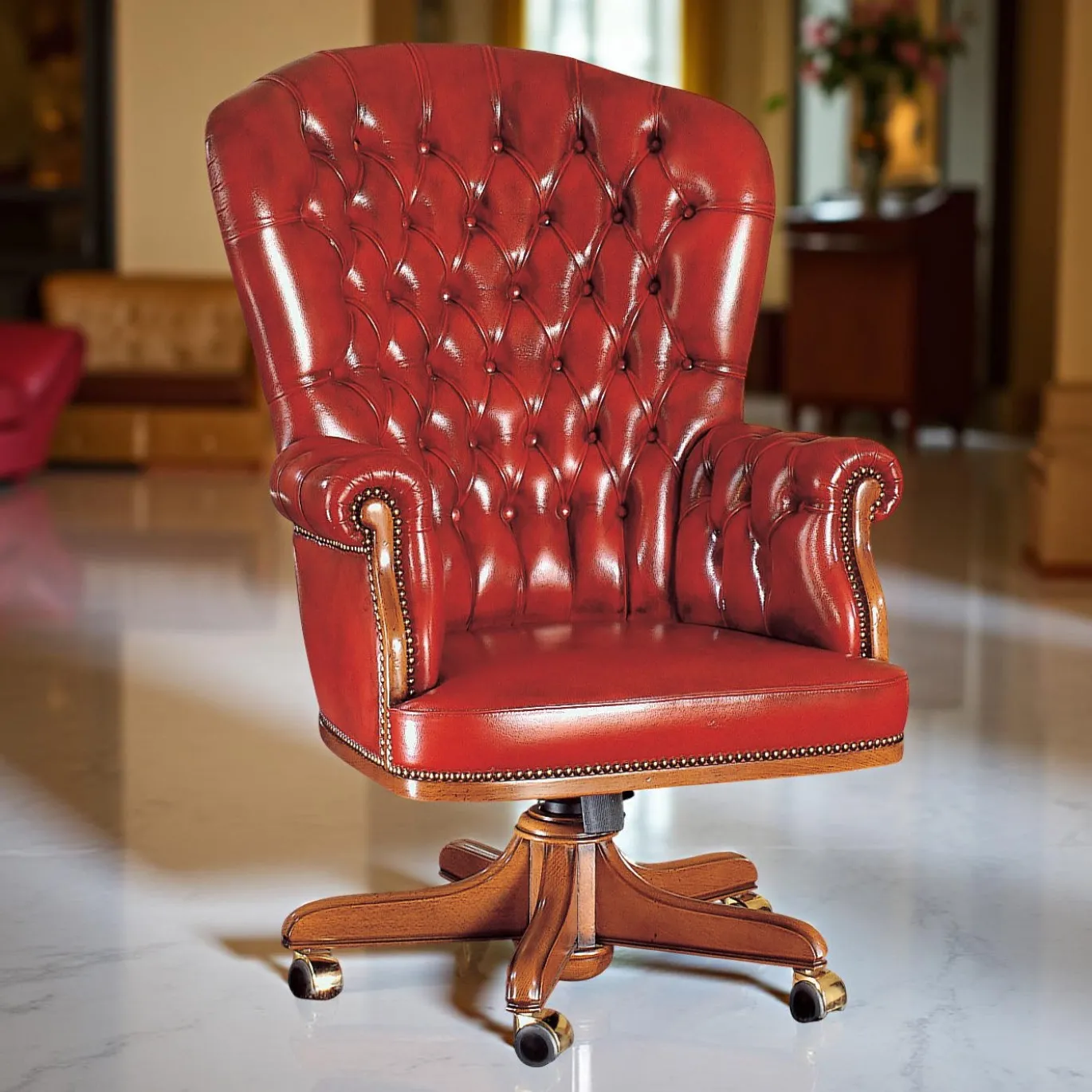 Poltrona in pelle rossa con bottoni