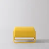 Poltrona lounge Kate Spark in tessuto tweed giallo con poggiapiedi