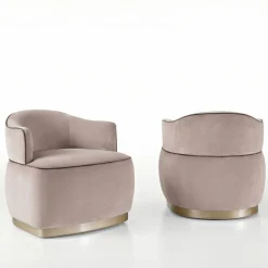 Poltrona Marceline in velluto con base in legno laccato metallico