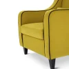 Poltrona St104 gialla con piping a contrasto