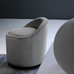 Poltroncina Elettra rotonda in velluto grigio con base nera