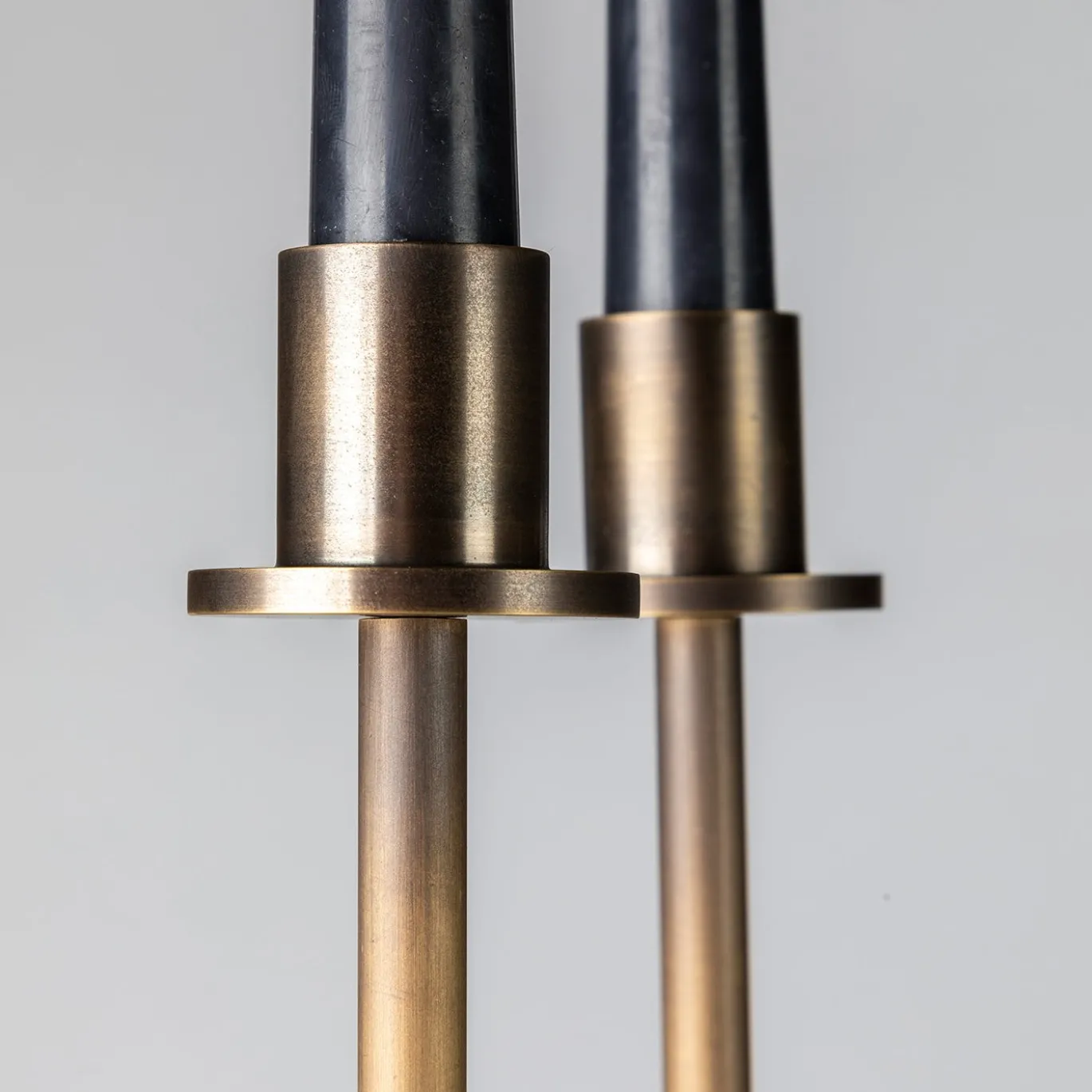 Portacandele doppio Gemini in ottone bronzato
