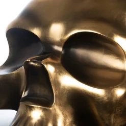 Scultura di teschio d'oro
