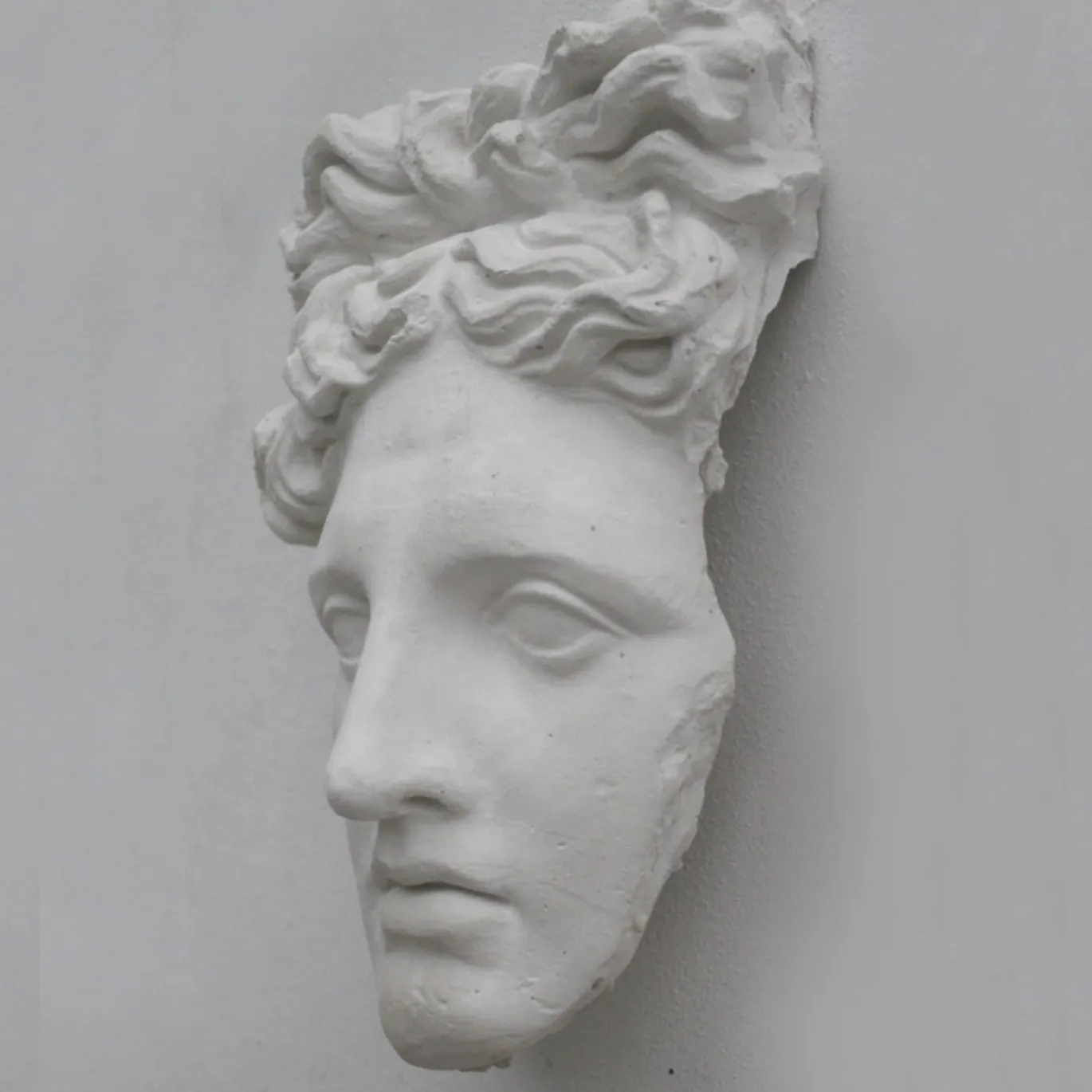 Scultura Maschera di Apollo in Gesso Bianco