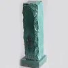 Scultura Menhir in pietra vulcanica smaltata verde