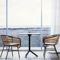 Sedia da esterno in rattan nero Raphia con cuscino di Lucidipevere