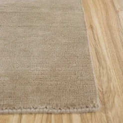 Tappeto in lana caviar beige morbido