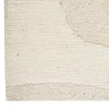 Tappeto in lana nei toni crema naturale e bianco neve