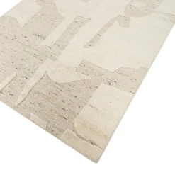 Tappeto in lana nei toni crema naturale e bianco neve
