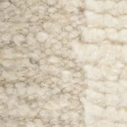 Tappeto in lana nei toni crema naturale e bianco neve
