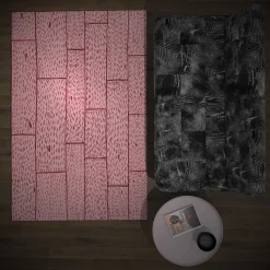 Tappeto in lana rosa fatto a mano con assi di legno