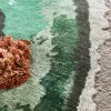 Tappeto rotondo Tactile verde in lana e seta di bambù