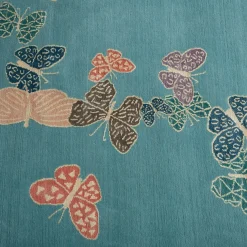 Tappeto Spirit in the Sky Butterfly Blue realizzato a mano in lana e seta