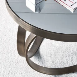 Tavolino Ottoline Gueridon con finitura bronzo e top in specchio