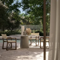 Tavolo da pranzo rotondo in porfido per esterni Etna di Massimo Castagna