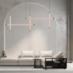 Trama S1 Una lampada a sospensione tubolare in vetro borosilicato rosa