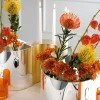 Vaso-candelabro semicircolare placcato oro Collezione Fellini
