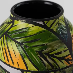 Vaso di foglie tropicali